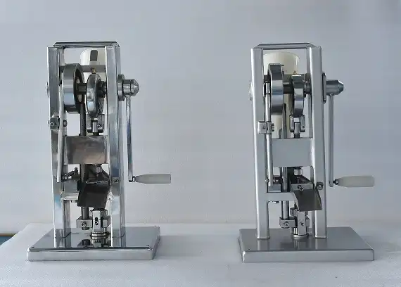 Handheld tablet press Handheld tablet press