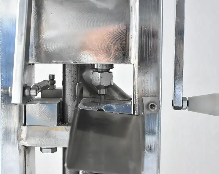 Handheld tablet press Handheld tablet press