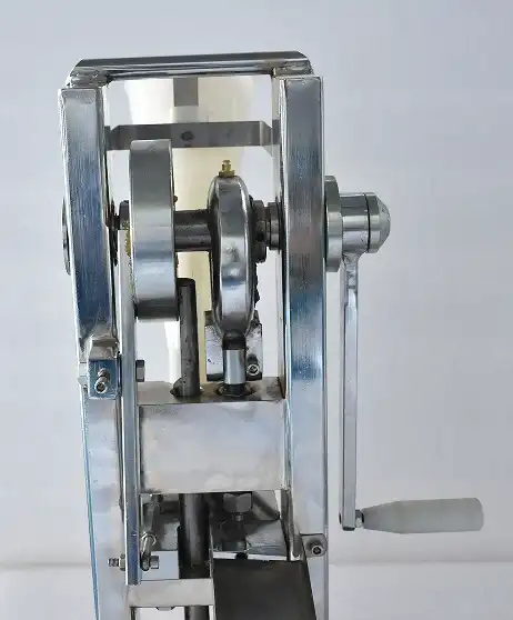 Handheld tablet press Handheld tablet press